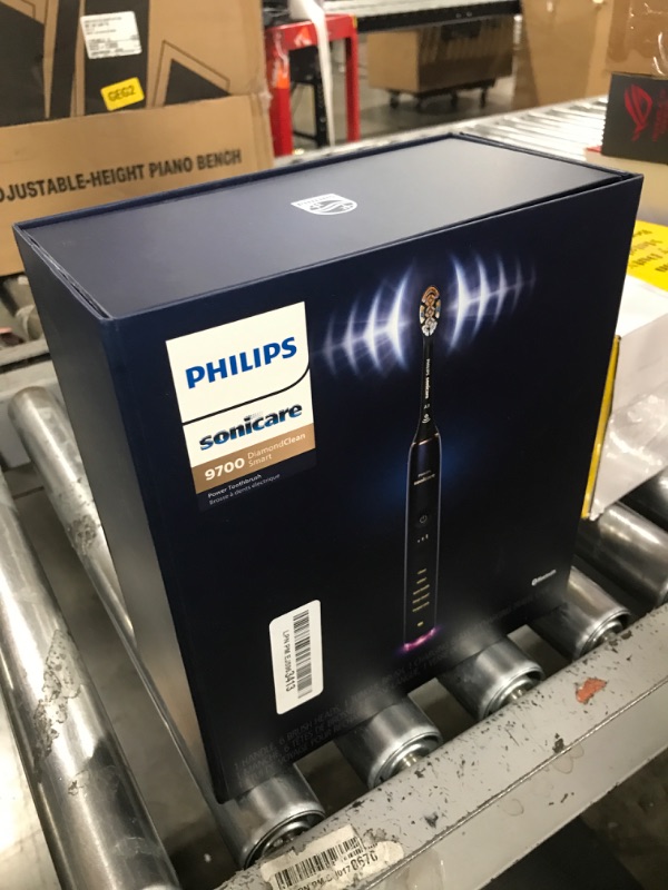 Photo 1 of Philips Sonicare DiamondClean Smart 9700 Electric Toothbrush, Sonic Toothbrush with App, Pressure Sensor, Brush Head Detection, 5 Brushing Modes and 3 Intensity Levels, Lunar Blue, Model HX9957/71