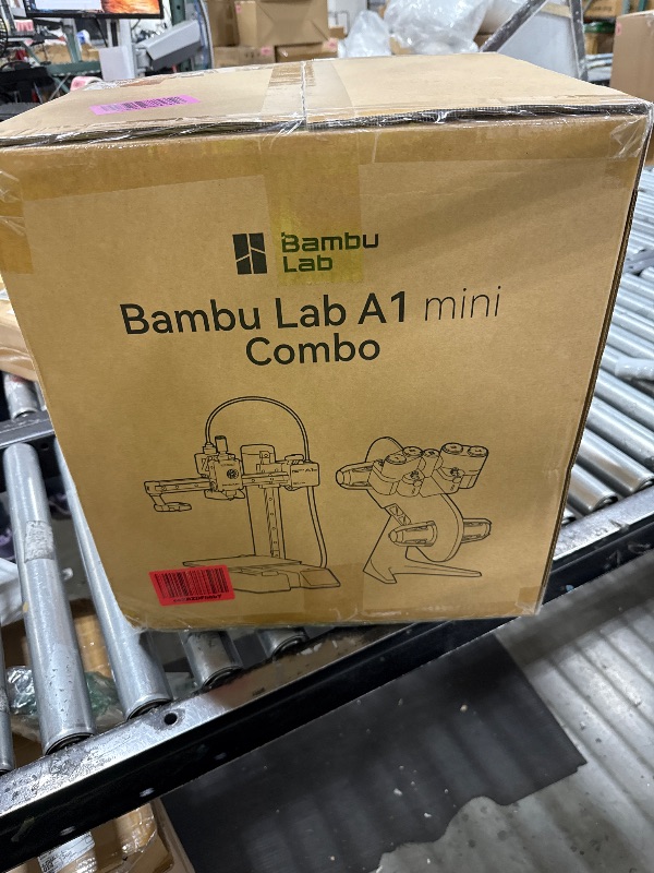 Photo 1 of Bambu Lab A1 Mini Combo, A1 Mini 3D Printer and AMS lite, Support Multi-Color 3D Printing, High Speed & Precision, Full-Auto Calibration & Active Flow Rate Compensation, ?48 dB Quiet FDM 3D Printers
