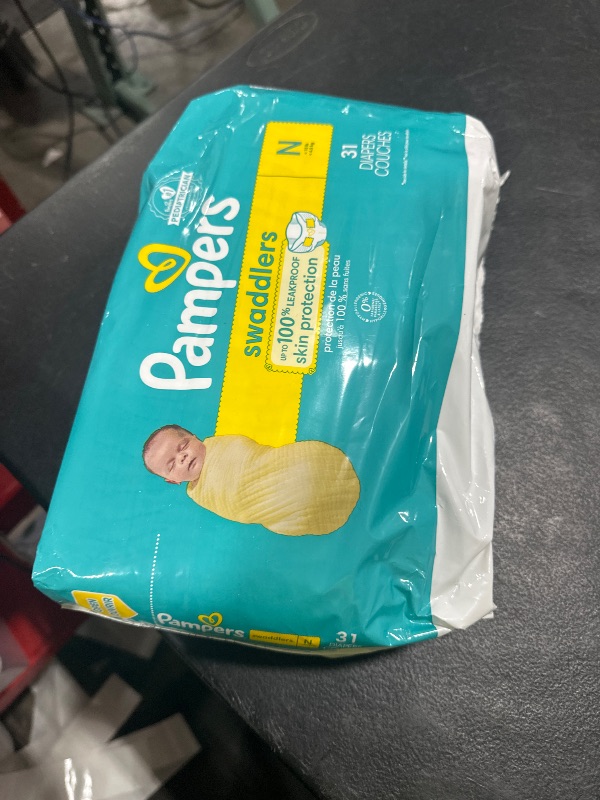 Photo 1 of Pampers Baby Diapers - Swaddlers - Size 0, 31 Count, Ultra Absorbent Disposable Newborn Diaper