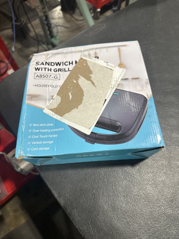 Photo 1 of OSTBA Sandwich Maker, 2 Slice Grilled Cheese Maker with Non-stick Grill Plates, Indicator Lights, Cool Touch Handle, Easy to Clean and Store, 750W