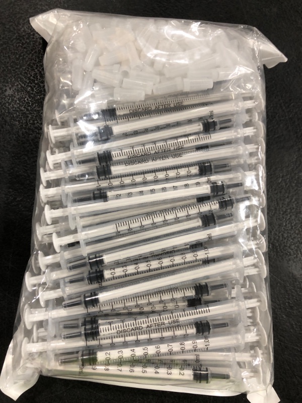 Photo 1 of 100 Pack 1ml Syringe with Cap for Liquid, 1cc Plastic Small Syringes with Cover, Non-Sterile, No Needle