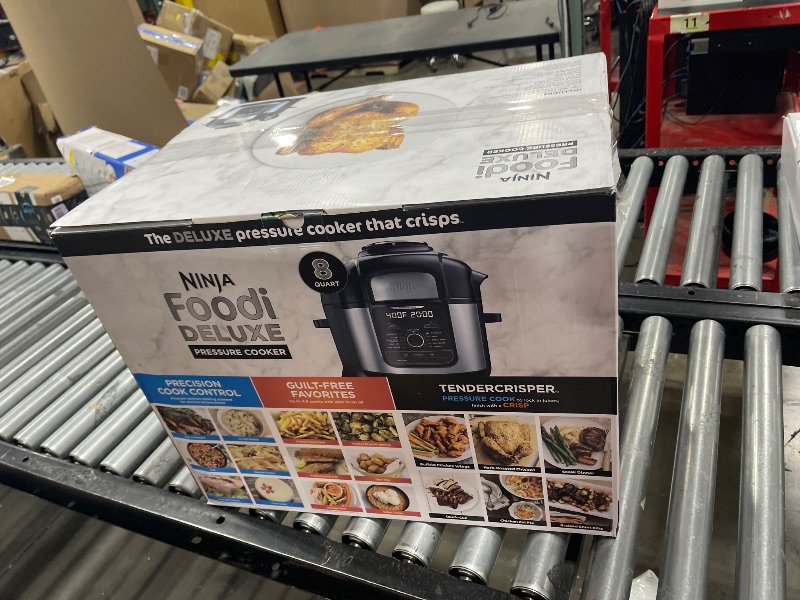 Photo 1 of Ninja FD401 LP3 Foodi 12-in-1 Deluxe XL 8 qt. Pressure Cooker & Air Fryer that Steams, Slow Cooks, Sears, Sautés, Dehydrates & More, with 5 qt. Crisper Basket, Reversible Rack & Recipe Book, Silver