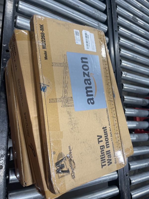 Photo 1 of Mounting Dream Tilting TV Mounts for Most 26-60 Inch LED, LCD TVs up to VESA 400 x 400mm and 88 LBS Loading Capacity, TV Wall Mount with Unique Strap Design for Easily Lock and Release MD2268-MK