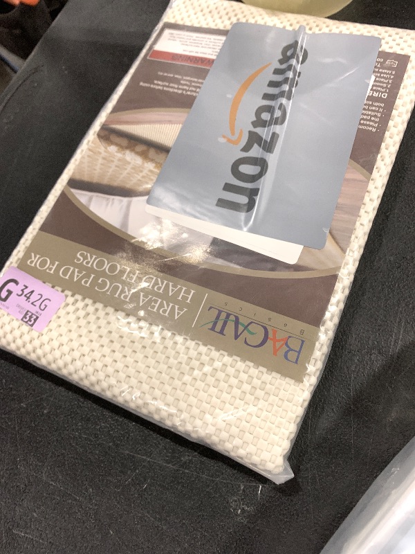 Photo 1 of BAGAIL BASICS Non Slip Rug Pad Gripper 2 x 3 Feet Extra Thick Carpet Pads for Area Rugs and Hardwood Floors, Keep Your Rugs Safe and in Place