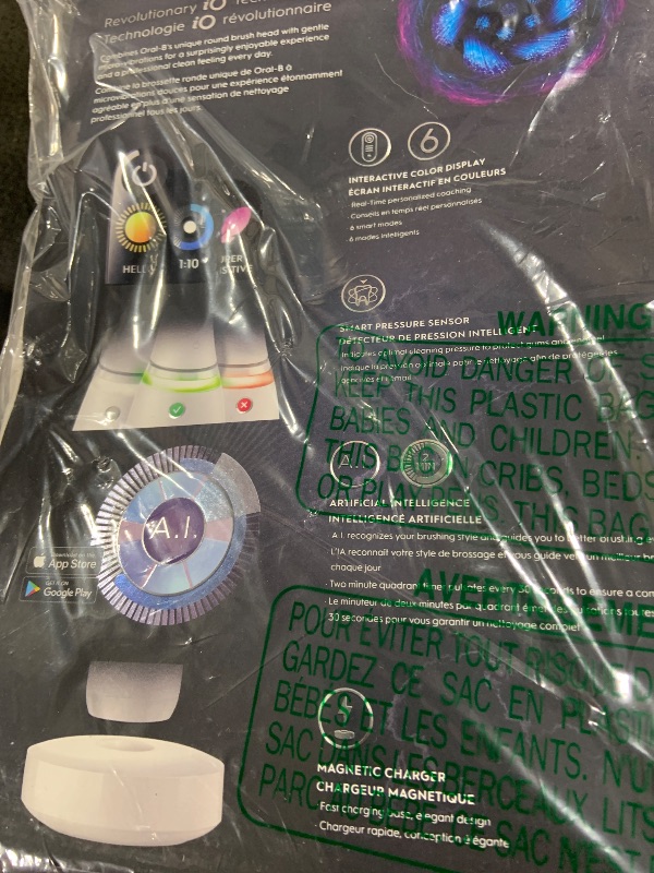 Photo 1 of Oral-B iO Series 8 Electric Toothbrush with 2 Replacement Brush Heads and Travel Case, Rechargeable Toothbrush, White Alabaster