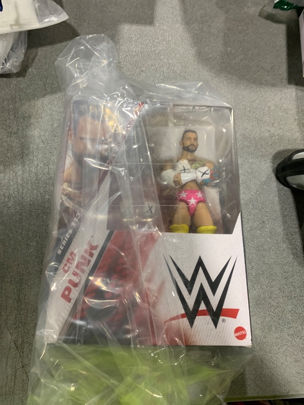 Photo 1 of Mattel WWE Elite Action Figure & Accessories, Series #113 6-inch Collectible 6-inch Collectible CM Punk with 25 Articulation Points & Swappable Hands