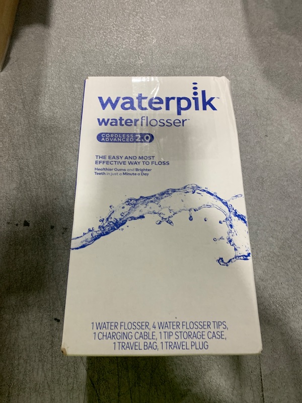 Photo 1 of Waterpik Cordless Advanced 2.0 Water Flosser For Teeth, Gums, Braces, Dental Care With Travel Bag and 4 Tips, ADA Accepted, Rechargeable, Portable, and Waterproof, Blue WP-583, Packaging May Vary