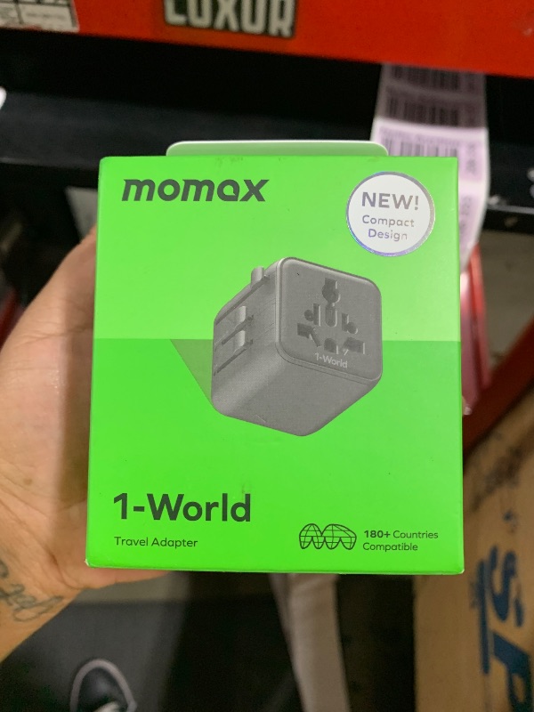 Photo 1 of MOMAX Universal Travel Adapter Mini Version, International Power Adapter for Most Europe, USA, Japan, Australia (Type C/A/G/I)