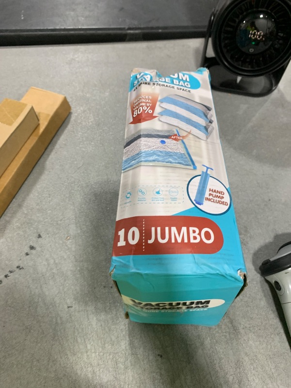 Photo 1 of Vacuum Storage Bags - 10 Jumbo Space Saver Bags With Pump for Clothes, Comforters, Blankets, Bedding