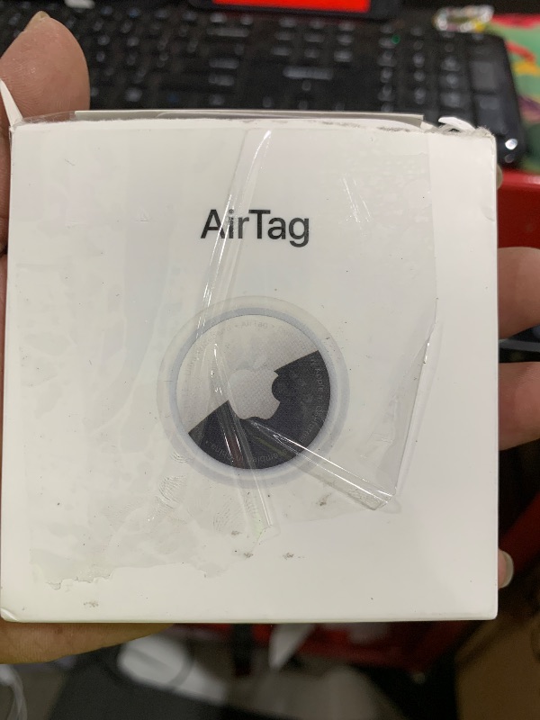 Photo 1 of Apple AirTag. Keep Track of and find Your Keys, Wallet, Luggage, Backpack, and More. Simple one-tap Set up with iPhone or iPad
