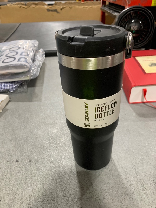 Photo 1 of Stanley IceFlow Stainless Steel Tumbler - Vacuum Insulated Water Bottle for Home, Office or Car Reusable Cup with Straw Leak Resistant Flip Cold for 12 Hours or Iced for 2 Days, Black 2.0, 30oz