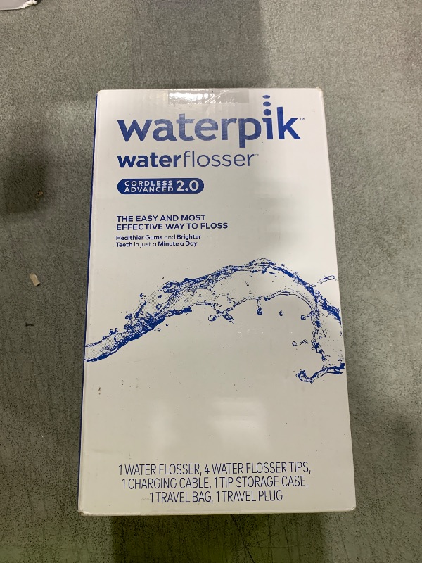 Photo 1 of Waterpik Cordless Advanced 2.0 Water Flosser For Teeth, Gums, Braces, Dental Care With Travel Bag and 4 Tips, ADA Accepted, Rechargeable, Portable, and Waterproof, Blue WP-583, Packaging May Vary