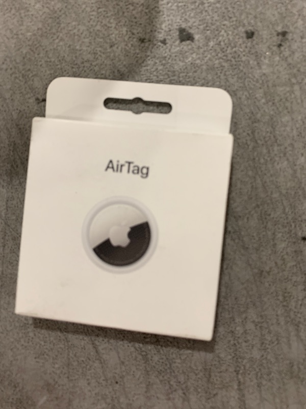 Photo 1 of Apple AirTag. Keep Track of and find Your Keys, Wallet, Luggage, Backpack, and More. Simple one-tap Set up with iPhone or iPad