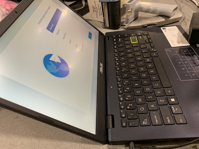 Photo 1 of ASUS Laptop, 14-inch FHD Display, Intel Pentium Silver N6000, 4GB RAM, 64GB eMMC Storage, Windows 11 Home in S Mode, Intel UHD Graphics, Star Black, E410KA-PM464