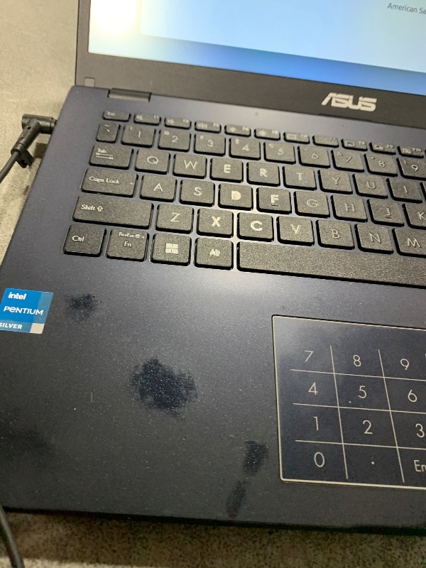 Photo 1 of ASUS Laptop, 14-inch FHD Display, Intel Pentium Silver N6000, 4GB RAM, 64GB eMMC Storage, Windows 11 Home in S Mode, Intel UHD Graphics, Star Black, E410KA-PM464
