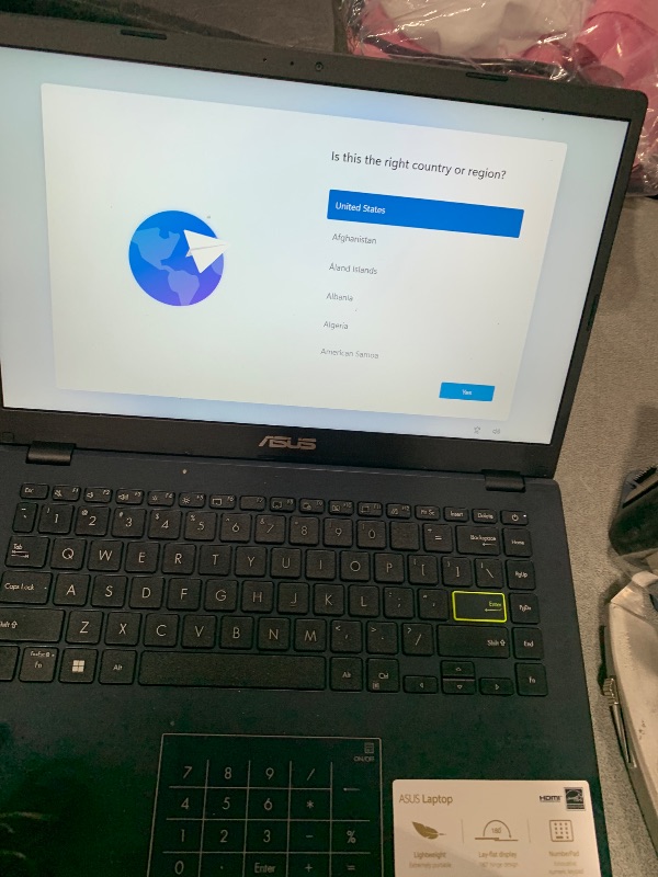 Photo 1 of ASUS Laptop, 14-inch FHD Display, Intel Pentium Silver N6000, 4GB RAM, 64GB eMMC Storage, Windows 11 Home in S Mode, Intel UHD Graphics, Star Black, E410KA-PM464