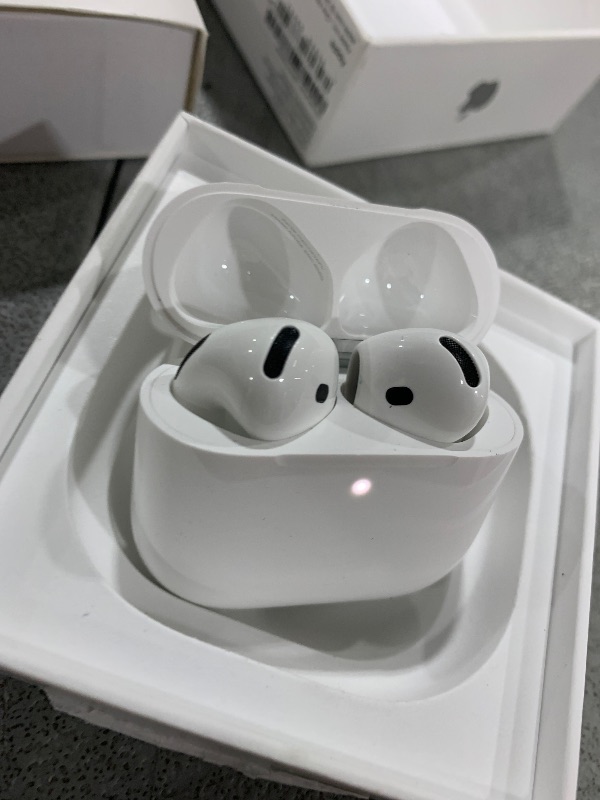Photo 1 of Apple AirPods 4 Wireless Earbuds, Bluetooth Headphones, Personalized Spatial Audio, Sweat and Water Resistant, USB-C Charging Case, H2 Chip, Up to 30 Hours of Battery Life, Effortless Setup for iPhone