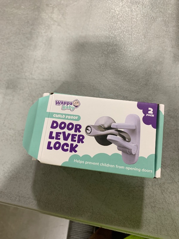 Photo 1 of Door Lever Lock (2 Pack) – Prevents Toddlers from Opening Doors – Easy One-Hand Operation for Adults – Durable ABS with 3M Adhesive Backing – No Tools Needed for Install