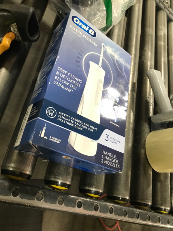Photo 1 of oral b water flosser 