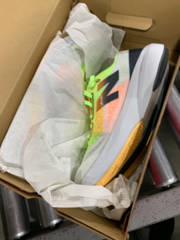 Photo 1 of New Balance Men's FuelCell Rebel V4 Running Shoe, White/Bleached Lime Glo/Hot Mango, 8.5