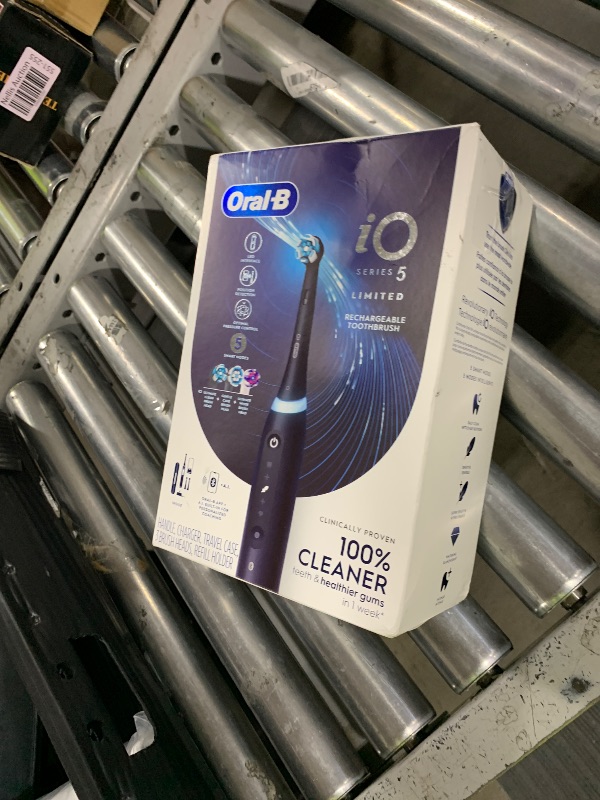 Photo 1 of Oral-B iO Deep Clean + Whiten Rechargeable Electric Toothbrush with Visible Pressure Sensor, 2 Minute Timer, 5 Cleaning Settings, 1 iO5 Limited, 3 Toothbrush Heads, Travel Case & Refill Holder, Black