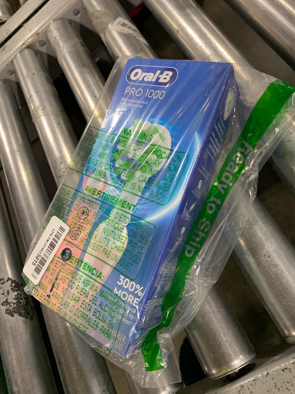 Photo 1 of Oral-B Pro 1000 Rechargeable Electric Toothbrush, Pink