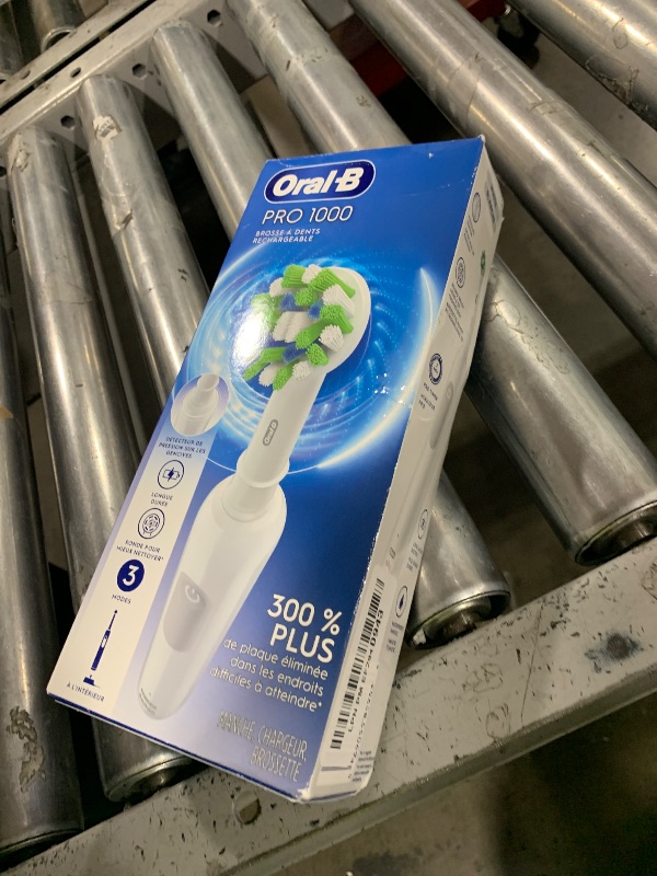 Photo 1 of Oral-B Pro 1000 Rechargeable Electric Toothbrush, White