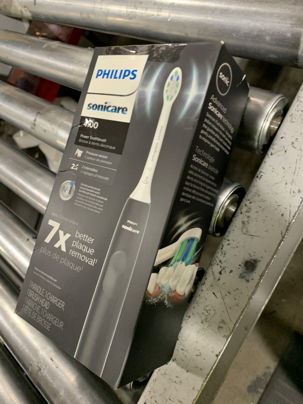 Photo 1 of Philips Sonicare 4100 Rechargeable Electric Toothbrush, with Pressure Sensor, 2 Intensity Settings, SmarTimer and QuadPacer, 14-Day Battery Life, Black, Model HX3681/24