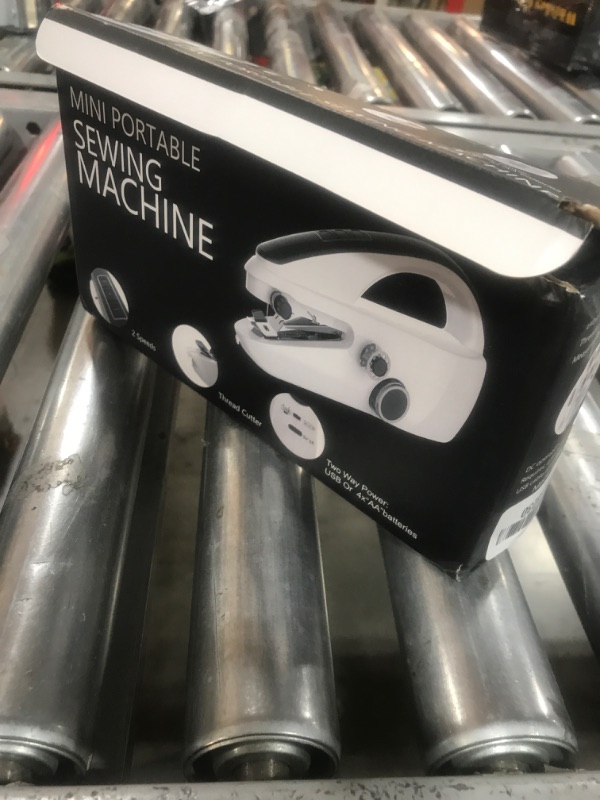 Photo 1 of Handheld sewing machine,portable,mini sewing machine,easy to use,fast sewing speed,suitable for sewing clothes,fabric,DIY Home machine for beginners.Grey