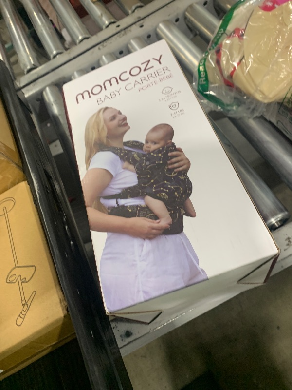 Photo 1 of Momcozy WeeSnug Baby Carrier - Cozy Comfort for Newborns 7-25 lbs, Ergonomic Cross-Back Support, Effortless to Put On, Hands-Free Infant Carrier with Lumbar Support, Light Purple