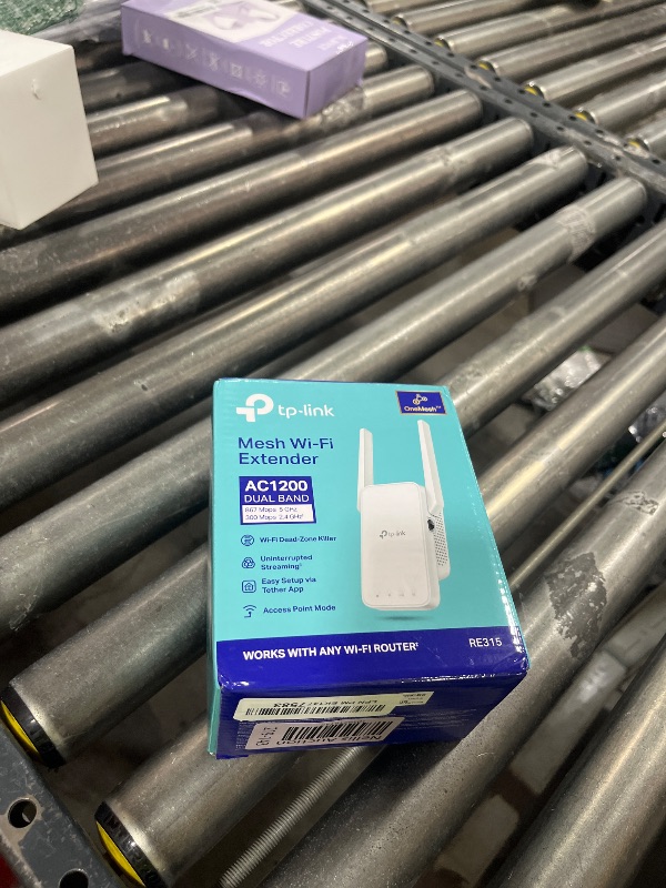 Photo 1 of TP-Link AC1200 WiFi Extender, 2025 Wirecutter Best WiFi Extender, 1.2Gbps home signal booster, Dual Band 5GHz/2.4GHz, Up to 1600 Sq.ft and 32 Devices, EasyMesh Compatible, One Ethernet Port (RE315)