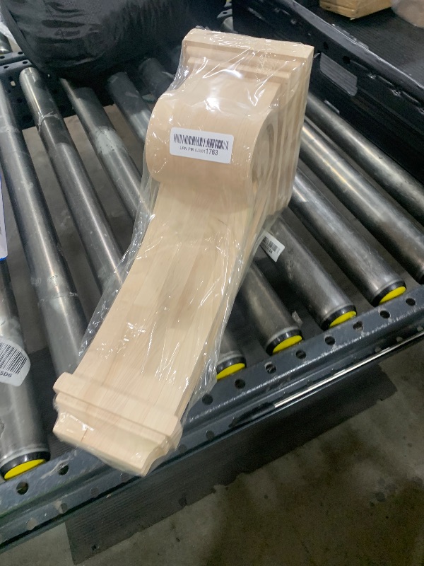 Photo 1 of Ekena Millwork CORW02X10X12ELRW Large Ellis Wood Corbels, 1 1/2"W x 10"D x 12"H, Rubberwood