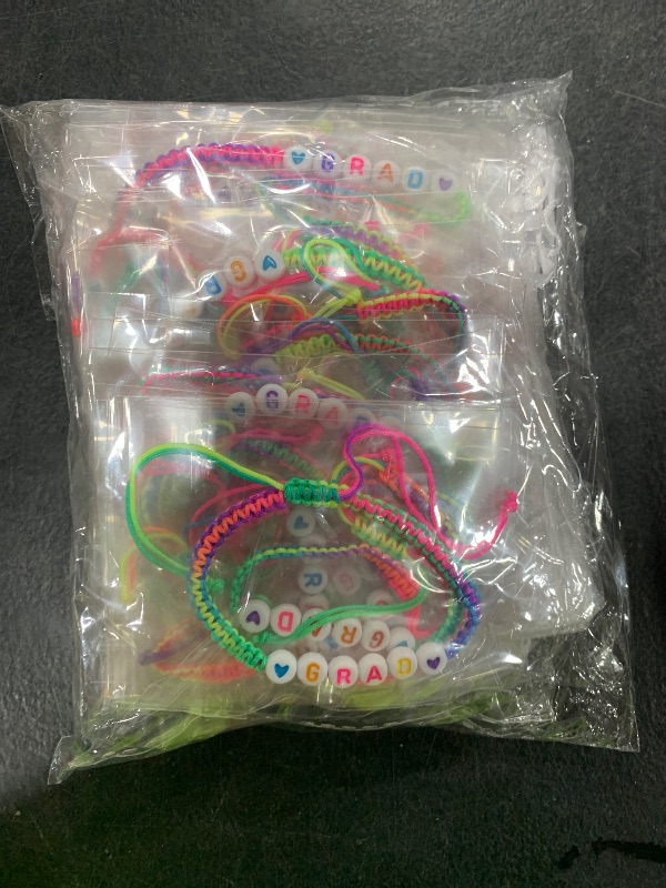 Photo 1 of BOLLBAY 24 Set Graduation Bracelets Bulk Kindergarten Graduation Bracelet with Wish Cards 4 x 5 Inch Organza Bags Colorful Adjustable Grad Kindergarten Graduation Gifts for Boys Girls