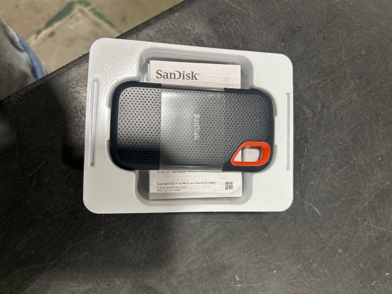 Photo 1 of SanDisk 1TB Extreme Portable SSD - Up to 1050MB/s, USB-C, USB 3.2 Gen 2, IP65 Water and Dust Resistance, Updated Firmware - External Solid State Drive - SDSSDE61-1T00-G25
