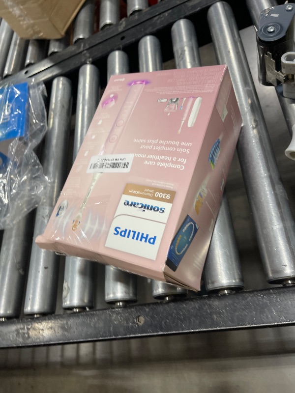 Photo 1 of Philips Sonicare DiamondClean Smart 9300 Electric Toothbrush, Sonic Toothbrush with App, Pressure Sensor, Brush Head Detection, 4 Brushing Modes and 3 Intensity Levels, Pink, Model HX9903/25