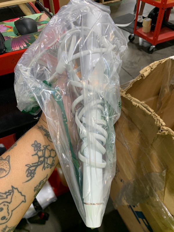 Photo 1 of T3 SinglePass Curl X Extra-Long Barrel 1", 1.25", 1.5" Curling Iron with 9 Heat Settings and Ceramic Barrel for Fast Styling and Lasting Results on All Hair Types
