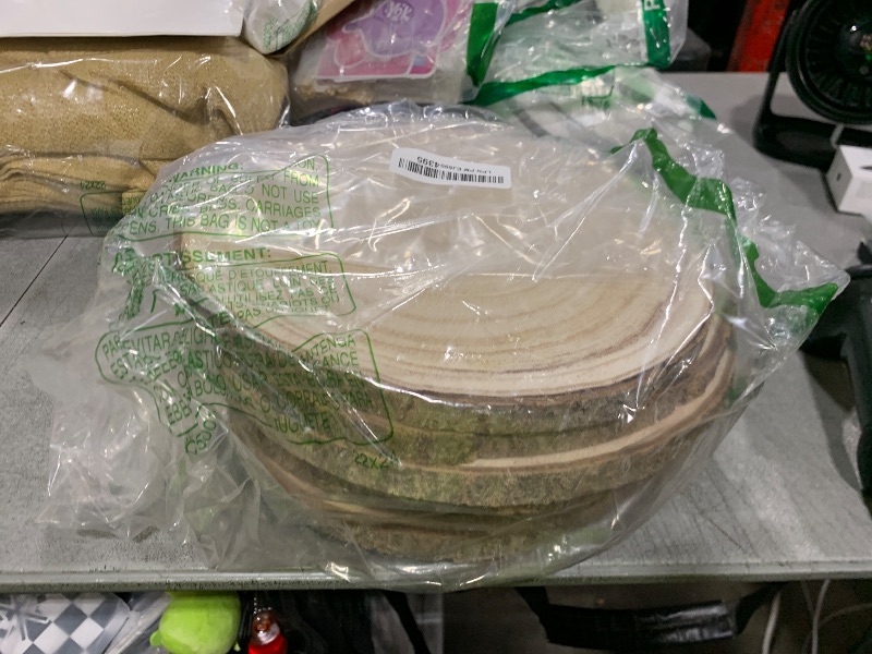 Photo 1 of KARAVELLA (10) Pack 11-12 inches Large Wood Slices for Centerpieces - Wood Centerpieces for Tables, Rustic Wedding Centerpiece, Natural Wood Slabs