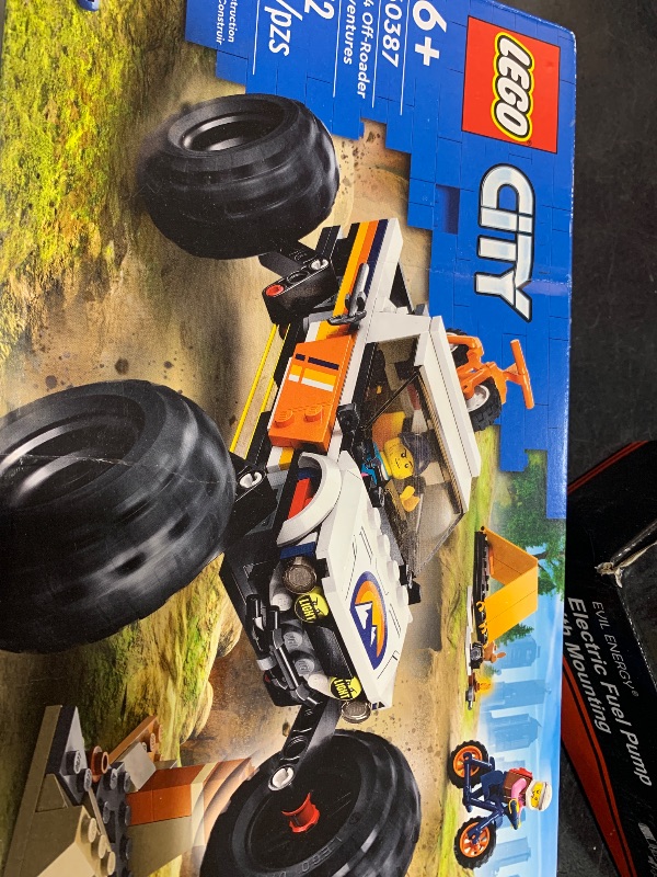 Photo 1 of LEGO City 4x4 Off-Roader Adventures 60387 Building Toy - Camping Set Including Monster Truck Style Car with Working Suspension and Mountain Bikes, 2 Minifigures, Vehicle Toy for Kids Ages 6+