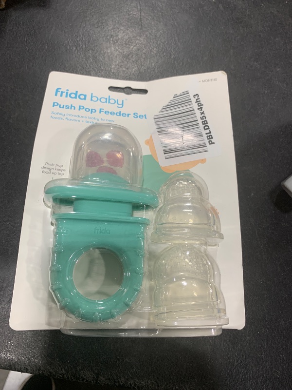 Photo 1 of Frida Baby Push Pop Feeder, Baby Fruit Food Feeder to Safely Introduce New Foods, Fresh + Frozen, Silicone, BPA Free, Dishwasher Safe | 3 Count, Teal