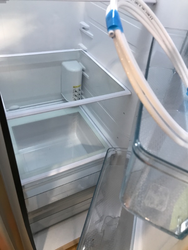 Photo 1 of 35.87 in. 20.01 cu. ft. Side-by-Side Refrigerator with Freezer and Ice Maker Included in Silver


