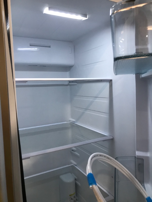 Photo 1 of 35.87 in. 20.01 cu. ft. Side-by-Side Refrigerator with Freezer and Ice Maker Included in Silver



