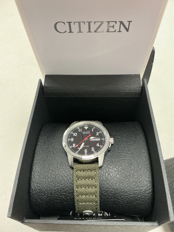 Photo 1 of Citizen Men's Eco-Drive Weekender Garrison Field Watch in Stainless Steel with Olive Nylon strap, Black Dial (Model: BM8180-03E)