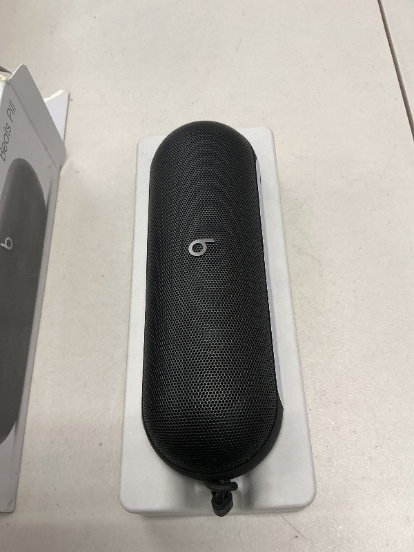 Photo 1 of Beats Pill - Portable Bluetooth Speaker - Up to 24H Battery Life, Water Resistant, Bluetooth, Apple & Android Compatible, Seriously Loud Sound for Home, Outdoor and Travel - Matte Black