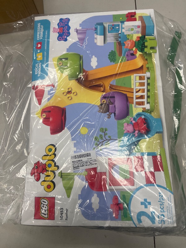 Photo 1 of LEGO DUPLO Peppa Pig Funfair Toddler Toy - Sensory Toy Featuring Peppa Pig - Fun Gift for 2+ Year Old Boy or Girl - Helps Preschoolers Develop Color Sorting and Fine Motor Skills - 10453