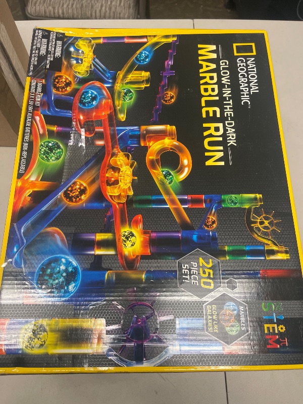 Photo 1 of NATIONAL GEOGRAPHIC Glowing Marble Run – 250 Piece Construction Set with 50 Glow in The Dark Glass Marbles & Storage Bag, STEM Gifts for Boys and Girls, Building Project Toy (Amazon Exclusive)