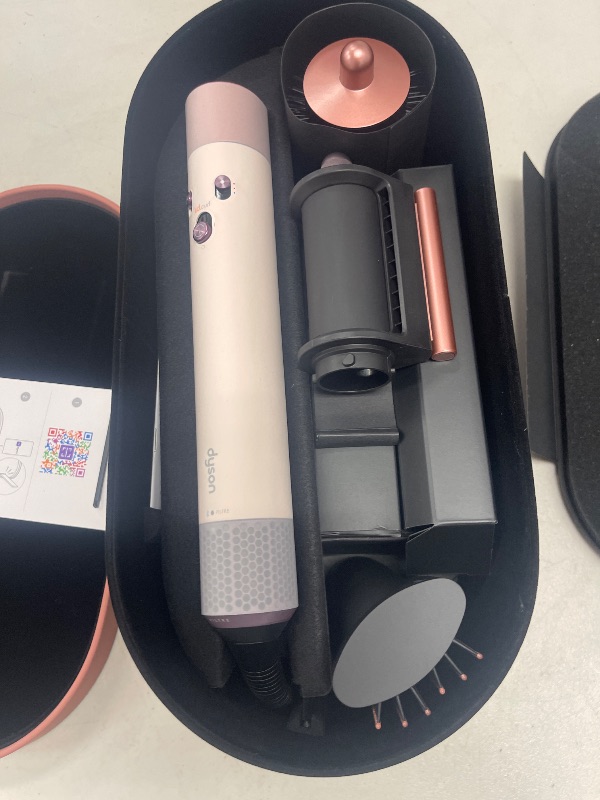 Photo 1 of Dyson Airwrap i.d.™ Multi-Styler and Dryer Straight+Wavy in Ceramic Pink and Rose Gold