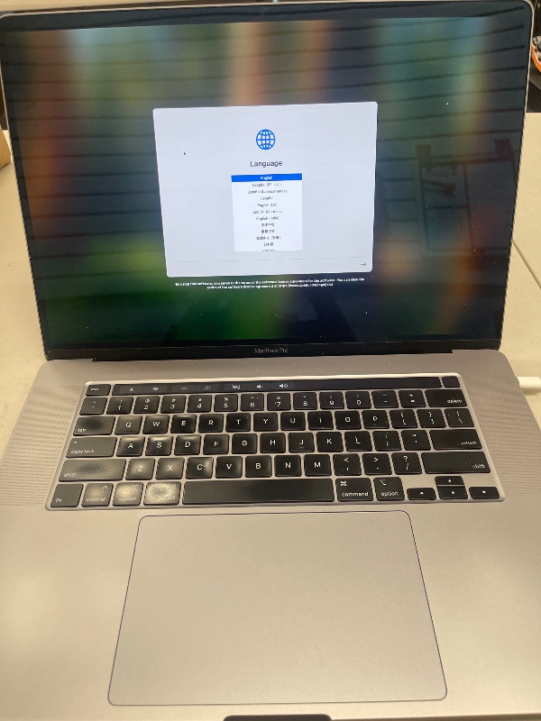 Photo 1 of Apple MacBook Pro with 2.6GHz 9th Gen Intel Core i7 (16 inch, 32GB RAM, 512GB SSD) Space Gray (Renewed)