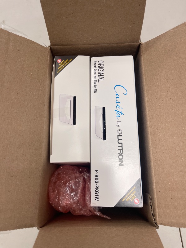Photo 1 of Lutron Caseta Original Smart Dimmer Switch Kit, 2 Dimmer Switches, 2 Wall Plates, 2 Pico Remotes, and Smart Hub, Works with Alexa, Apple Home, Google Home, 3 Way, 150W, No Neutral, P-BDG-PKG2W-A