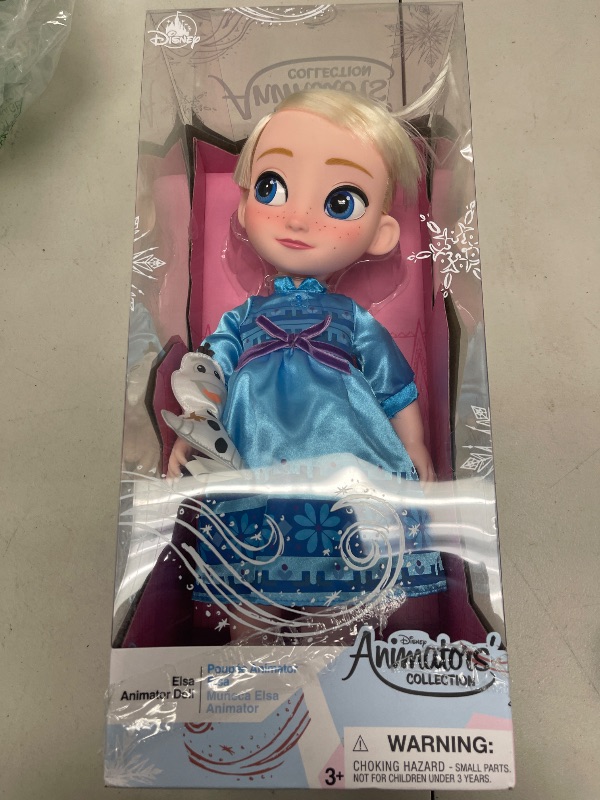 Photo 1 of Disney Store Official Animators' Collection Elsa Doll, Frozen, 16 Inches, Includes Olaf with Molded Details, Fully Posable Toy in Satin Dress - Suitable for Ages 3+ Toy Figure