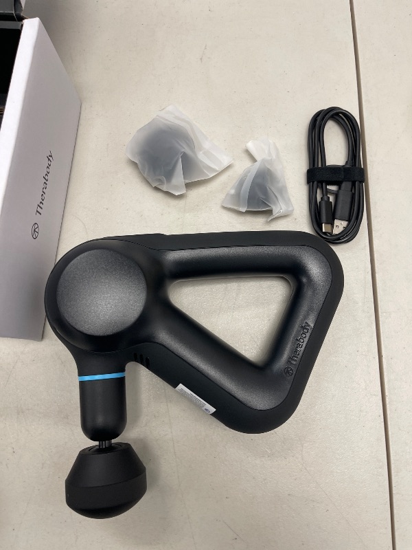 Photo 1 of TheraGun Therabody Prime (5th Generation) - Deep Tissue Percussion Therapy Massage Gun - Bluetooth Enabled, Personal Massager for Pain Relief in Neck, Back, Leg, Shoulder and Body (Black)